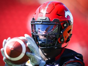 Regina product and Calgary Stampeders receiver Richie Sindani, shown warming up before a 2021 regular-season CFL game, has been suspended for two games for violating the CFL's drug policy.