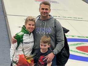 Kelly Schafer (left) celebrated her first Saskatchewan women's curling championship with her husband, Jerrod, and her eight-year-old son Darby in Estevan on Jan. 29. Photo courtesy Jerrod Schafer.