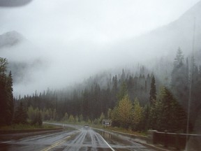Saskatchewan Mounties drive through pouring rain in the Okanagan Valley on the trail of a van on Oct. 1, 2011.