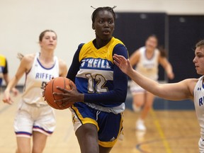 Ajok Madol, shown with the O'Neill Titans senior girls basketball team, is part of the University of Minnesota Gophers' 2023-24 recruiting class.
