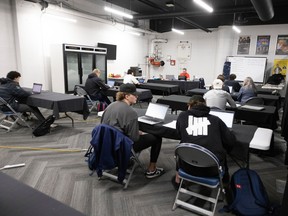 Regina Pats players are shown in their downstairs high school classroom at the Brandt Centre.