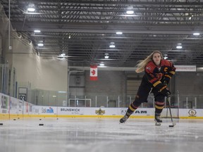 Greta Henderson, a member of the Regina Avana Rebels, is leading the Saskatchewan Female Under-18 AAA Hockey League in scoring.