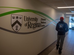 A sign displaying the Student Wellness Centre is posted on a wall at the Paskwaw Tower on the University of Regina Campus.