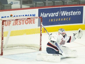 Regina Pats goaltender  Kelton Pyne makes a glove save against the Seattle Thunderbirds on Friday at the Brandt Centre.