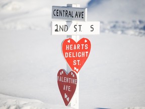 Heart-shaped street signs can be seen around the town of Love, Sask.