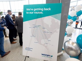 A sign showing the flight paths WestJet is adding is on display during the celebration of the new WestJet U.S. route from Saskatoon and expansion of domestic connectivity throughout Saskatchewan on Friday, Feb. 17, 2023.