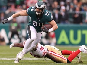 Dallas Goedert #88 of the Philadelphia Eagles makes a catch against Oren Burks #48 of the San Francisco 49ers during the first quarter in the NFC Championship Game at Lincoln Financial Field on January 29, 2023 in Philadelphia, Pennsylvania.