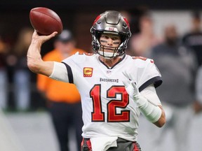 Buccaneers quarterback Tom Brady throws a pass against the Falcons in the first quarter at Mercedes-Benz Stadium in Atlanta, Sunday, Jan. 8, 2023.