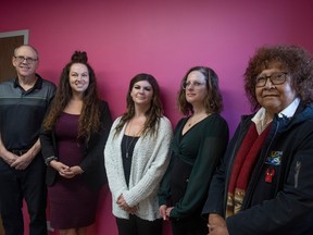 Regina Leader-Post sports editor Rob Vanstone is shown with representatives of Regina's four women's shelters. Left to right: Chelsey Lemke (YWCA Regina), Tmira Marchment (SOFIA House), Stephanie Taylor (Regina Transition House) and Anna Crowe (WISH Safe House).
