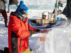 Ice sculptor Kelly Davies works on a piece of ice in Confederation Park as part of Frost Regina on Thursday, Feb 2, 2023.