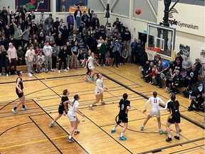 A last-second shot by the Winnipeg Dakota Lancers approaches the basket in the Luther Invitational Tournament's senior girls final Saturday. The shot was rebounded by the Raymond Comets' Delaney Gibb, who scored 31 points in her team's 64-62 victory.