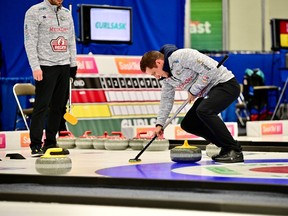 Highland Curling Club skip Kelly Knapp sweeps a rock during Saturday's 1-2 Page playoff game at the Saskatchewan men's curling championship, held at Affinity Place in Estevan.