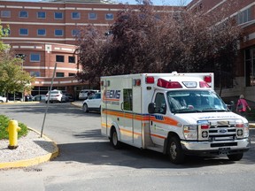 An ambulance exits Regina General Hospital in Regina, Saskatchewan on September 14, 2021.