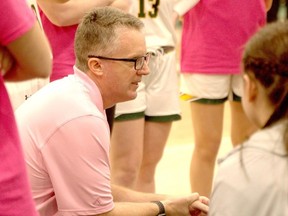 University of Regina Cougars women's basketball coach Dave Taylor talks to his players Friday against the University of Calgary Dinos.