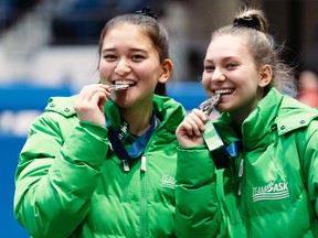 Jami Reschke (left) and Halle Pipko of Regina won a silver medal Monday in synchro female trampoline at the 2023 Canada Winter Games in Charlettetown, P.E.I. on Monday. The medals were the first won by Regina athletes at the Canada Winter Games. Michael Scraper/Team Sask,