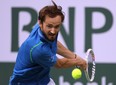 Daniil Medvedev of Russia plays a backhand in his three set win over Alexander Zverev of Germany during the BNP Paribas Open at the Indian Wells Tennis Garden on March 14, 2023 in Indian Wells, California. (Photo by Harry How/Getty Images)