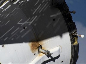 A view shows external damage believed to have caused a loss of pressure in the cooling system of the Soyuz MS-22 spacecraft docked to the International Space Station (ISS), in this image released Feb. 13, 2023.