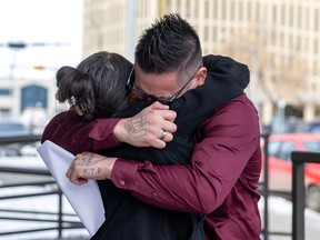 Nadine Goodwill, , left, hugs her son Catlin Goodwill as he leaves Court of Kings Bench on Thursday, March 16, 2023 in Regina. A not quality verdict was made in the manslaughter case of Catlin Goodwill, accused of killing three-month-old Keenan Julius Spencer on Oct. 14, 2017.