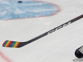 A view of the stick of Washington Capitals right wing Tom Wilson (43) on ice during warmup with rainbow stick tape in recognition of Pride Night prior to their game against the Minnesota Wild at Capital One Arena.