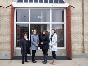 Square One Community Inc.'s board of directors Christine Boyczuk (left), chair Della Ferguson, vice-chair Crystal Froese and Jill Lesuk stand outside the future home of a 24-hour warming centre and women's homeless shelter on Fairford Street West in Moose Jaw on Friday, March 3, 2023. Missing in photo are remaining board members Sue Karner, Ashey Florent, and Anne-Marie Ursan.