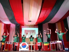 Nanta Team drums on tables at the Korean pavilion at the Mosaic cultural festival in Regina, Sask. on Saturday June 1, 2013.