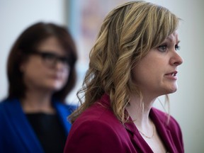 NDP health critic Vicki Mowat described this year's health budget investments as just "keeping pace" with inflation and needs of health-care workers. She is seen here speaking to reporters on March 22, 2023 at the Saskatchewan Legislative Building.