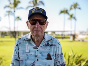 In this photo provided by the U.S. Marine Corps, former U.S. Navy coxswain Howard "Ken" Potts attends the Freedom Bell Opening Ceremony and Bell Ringing at USS Bowfin Submarine Museum & Park on Pearl Harbor, Hawaii, Dec. 6, 2016.