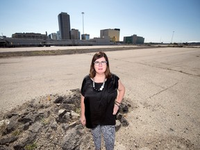Warehouse District executive director Leasa Gibbons stands in the former CP rail yard lot in Regina on September 5, 2018.