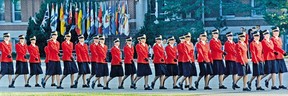 Female RCMP officers march at Depot in their dress uniforms in July 1987 in Regina.