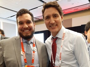 Isaiah Robinson, councillor of the Kitasoo Xai’xais First Nation in Klemtu, B.C., and Prime Minister Justin Trudeau.