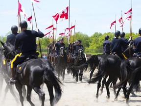 The Royal Canadian Mounted Police Musical Ride troop practices at their stables in Ottawa on Wednesday, May 17, 2023. This year marks the 150th Anniversary of the RCMP.