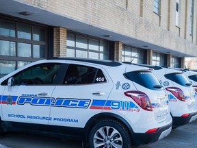 Regina Police Service School Resource Officer cruisers parked at headquarters.