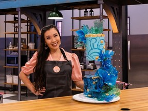 Saskatoon baker Venessa Liang stands with the cake she created during the regional final in CTV's baking competition show Cross Country Cake Off.