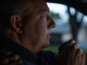Regina Police Service Chief Evan Bray radios command while on a night shift on Sunday, June 25, 2023 in Regina.
