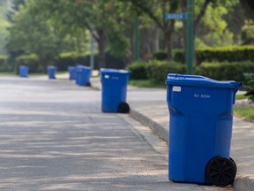 Recycling bins awaiting pickup on a Regina street.