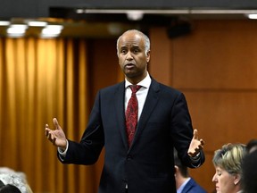 Minister of Housing and Diversity and Inclusion Ahmed Hussen rises during Question Period in the House of Commons on Parliament Hill in Ottawa on Thursday, Dec. 1, 2022. THE CANADIAN PRESS/Justin Tang