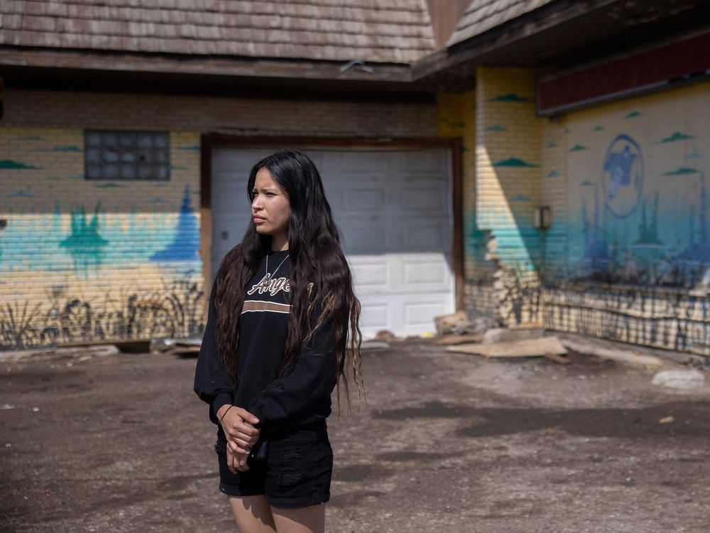  shay scales, granddaughter of manager ivy kennedy at the women of the dawn counselling centre, stands for a portrait behind a possible location for anti-fentanyl signs that will be posted around the north central neighbourhood, on tuesday, june 6, 2023 in regina.