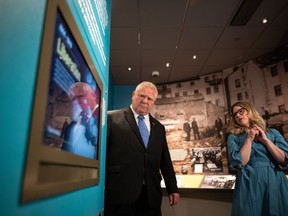 Ontario Premier Doug Ford is guided through a tour at the Toronto Holocaust Museum on Friday, June 9, 2023.