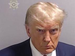 Former U.S. President Donald Trump looks none too happy in his booking photo taken at Atlanta's Fulton County Jail on August 24, 2023.