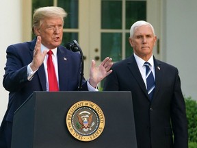 U.S. President Donald Trump and Vice President Mike Pence during a news conference at the White House on April 27, 2020.