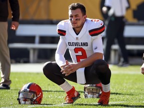 Cleveland Browns quarterback Johnny Manziel waits for the team's game against the Pittsburgh Steelers to start on Nov. 15, 2015.