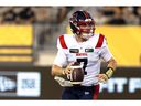 Montreal Alouettes quarterback Cody Fajardo (7) carries the ball during second half CFL football game action against the Hamilton Tiger-Cats in Hamilton, Ont. on Saturday, August 5, 2023.