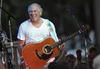 Jimmy Buffett performs at his sister’s restaurant in Gulf Shores, Ala., on June 30, 2010.