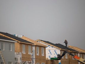 Construction crews work on new builds in Regina's south east on Friday, September 15, 2023 in Regina.