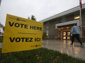 A person heads to a polling station to vote in Manitoba's general election on Oct. 3, 2023. Chris Procaylo/Winnipeg Sun