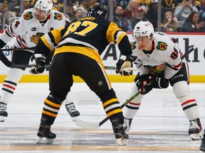 Bedard, Crosby take face-off to start Blackhawks-Penguins season