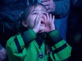 A young fan cheers on Saskatchewan Rush in March 2023. The Rush has 30 players for the start of training camp, including three goalies, 16 defenders/transition players and 11 forwards.