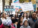 Protesters and counter-protesters on gender identity policies in schools take place in Saskatoon, Sask. in September of 2023.