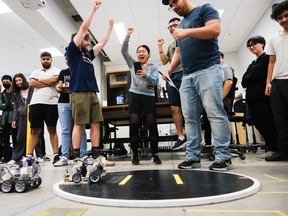 Students testing robots in the Mechatronic Systems Engineering sumo battle. SUPPLIED