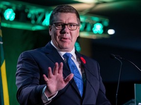 Saskatchewan Premier Scott Moe gestures while speaking at his party's convention in Regina, on Saturday, Nov. 4, 2023.